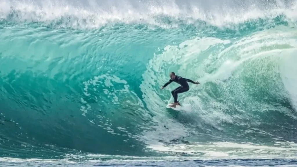 Surfing at Paradise Beach